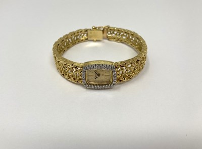 Lot 308 - OMEGA: A LADY'S GOLD AND DIAMOND BRACELET WATCH, SWISS, CIRCA 1966