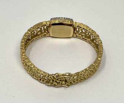 Lot 308 - OMEGA: A LADY'S GOLD AND DIAMOND BRACELET WATCH, SWISS, CIRCA 1966