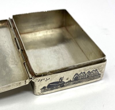 Lot 40 - AN IRAQI NIELLO DECORATED CIGARETTE BOX, BAGHDAD, CIRCA 1960