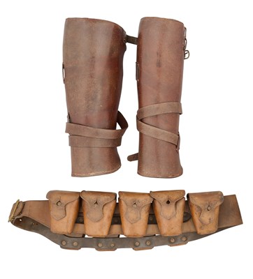 Lot 737 - A PAIR OF LEATHER REGULATION GAITERS AND A LEATHER AMMUNTION BELT, EARLY 20TH CENTURY