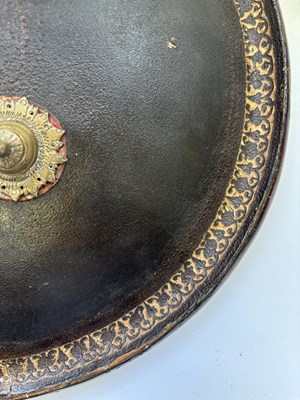 Lot 20 - AN INDIAN HIDE SHIELD (DHAL), 19TH CENTURY, SIGNED BHAGUAN KHOOSALOA, AHMEDABAD