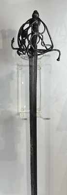 Lot 150 - A RARE NORTH EUROPEAN BASKET-HILTED BACK-SWORD, EARLY 17TH CENTURY, DUTCH OR ENGLISH