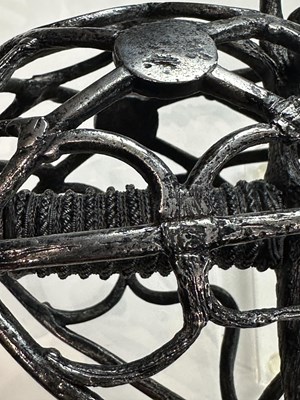 Lot 150 - A RARE NORTH EUROPEAN BASKET-HILTED BACK-SWORD, EARLY 17TH CENTURY, DUTCH OR ENGLISH