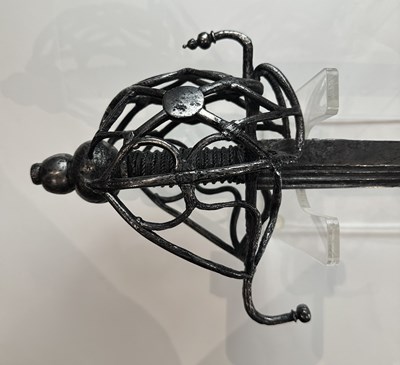 Lot 150 - A RARE NORTH EUROPEAN BASKET-HILTED BACK-SWORD, EARLY 17TH CENTURY, DUTCH OR ENGLISH