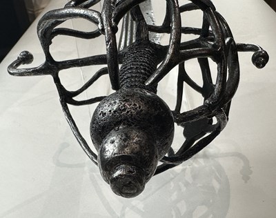 Lot 150 - A RARE NORTH EUROPEAN BASKET-HILTED BACK-SWORD, EARLY 17TH CENTURY, DUTCH OR ENGLISH