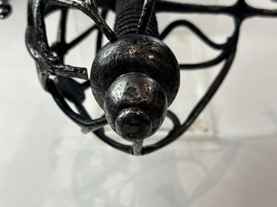 Lot 150 - A RARE NORTH EUROPEAN BASKET-HILTED BACK-SWORD, EARLY 17TH CENTURY, DUTCH OR ENGLISH