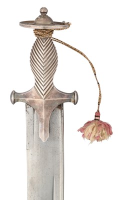 Lot 54 - A FINE INDIAN SWORD WITH KHYBER STYLE BLADE AND SILVER TALWAR HILT, 19TH CENTURY