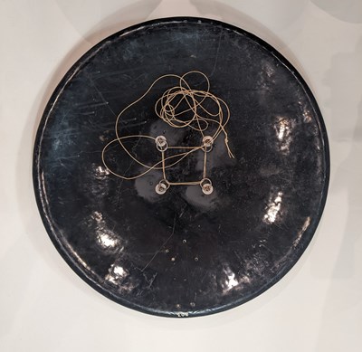 Lot 78 - A NORTH INDIAN LAQUERED SHIELD (DHAL), 19TH CENTURY, PERHAPS SIND