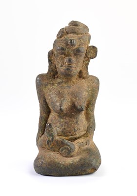 Lot 254 - A MAJAPAHIT BRONZE FIGURE OF A WOMAN, JAVA, CIRCA 14TH CENTURY