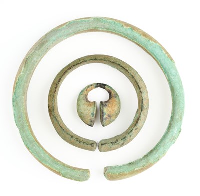 Lot 223 - THREE ITEMS OF ANCIENT BRONZE JEWELLERY, PROBABLY JAVA, 9TH/10TH CENTURY