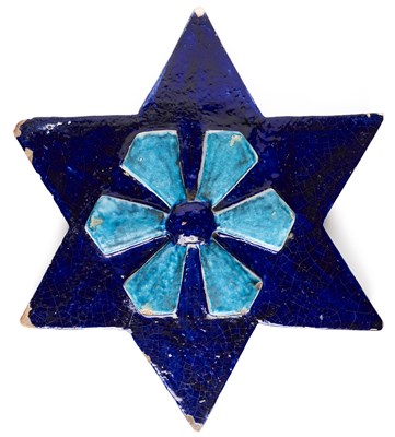 Lot 122 - A LARGE GLAZED POTTERY STAR TILE, MULTAN, PAKISTAN, 19TH CENTURY OR EARLIER