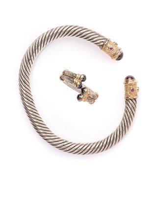 Lot 330 - A SILVER AND GARNET BANGLE AND RING
