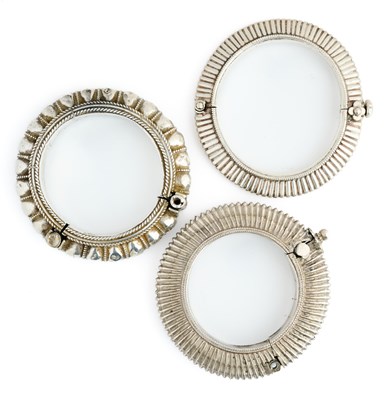 Lot 68 - THREE SILVER BRACELETS, INDIA, CIRCA 1900