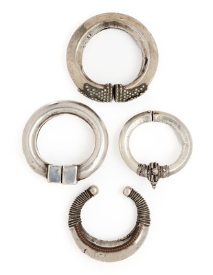 Lot 64 - FOUR SILVER BRACELETS, RAJASTHAN OR GUJARAT, INDIA, CIRCA 1900