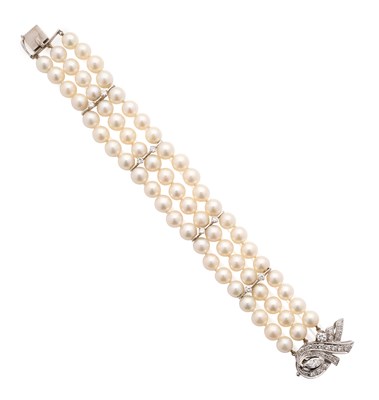 Lot 817 - CULTURED PEARL AND DIAMOND BRACELET, 1960s