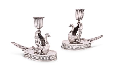 Lot 115 - TWO RUSSIAN SILVER 'SWAN' CHAMBER CANDLESTICKS, GOTTHARD FERDINAND STANG, ST PETERSBURG, CIRCA 1809
