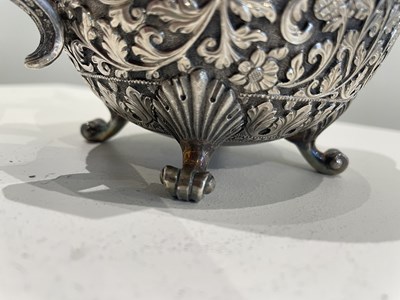 Lot 206 - A KUTCH SILVER TEASET, OOMERSI MAWJI OF BHUJ, WESTERN INDIA, 1880-1890