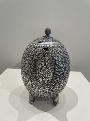 Lot 206 - A KUTCH SILVER TEASET, OOMERSI MAWJI OF BHUJ, WESTERN INDIA, 1880-1890