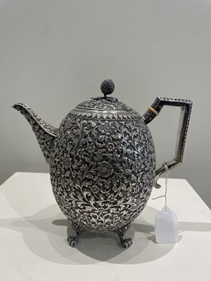 Lot 206 - A KUTCH SILVER TEASET, OOMERSI MAWJI OF BHUJ, WESTERN INDIA, 1880-1890