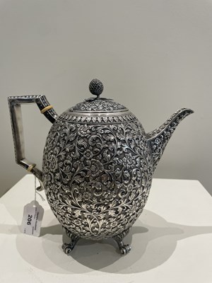 Lot 206 - A KUTCH SILVER TEASET, OOMERSI MAWJI OF BHUJ, WESTERN INDIA, 1880-1890