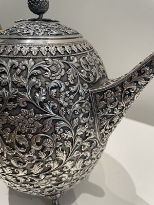 Lot 206 - A KUTCH SILVER TEASET, OOMERSI MAWJI OF BHUJ, WESTERN INDIA, 1880-1890