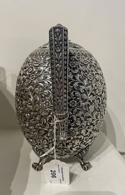 Lot 206 - A KUTCH SILVER TEASET, OOMERSI MAWJI OF BHUJ, WESTERN INDIA, 1880-1890