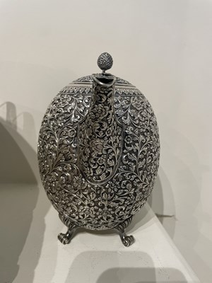 Lot 206 - A KUTCH SILVER TEASET, OOMERSI MAWJI OF BHUJ, WESTERN INDIA, 1880-1890