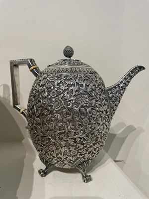 Lot 206 - A KUTCH SILVER TEASET, OOMERSI MAWJI OF BHUJ, WESTERN INDIA, 1880-1890