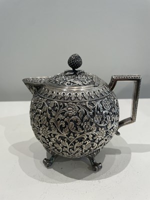 Lot 206 - A KUTCH SILVER TEASET, OOMERSI MAWJI OF BHUJ, WESTERN INDIA, 1880-1890