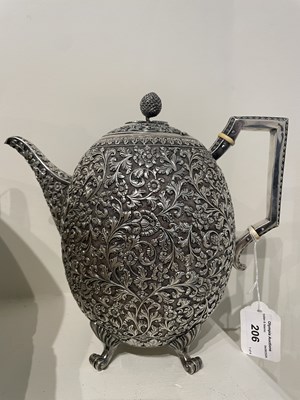 Lot 206 - A KUTCH SILVER TEASET, OOMERSI MAWJI OF BHUJ, WESTERN INDIA, 1880-1890