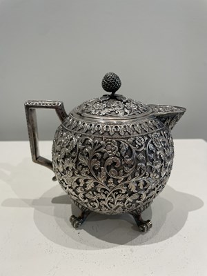 Lot 206 - A KUTCH SILVER TEASET, OOMERSI MAWJI OF BHUJ, WESTERN INDIA, 1880-1890