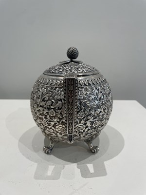 Lot 206 - A KUTCH SILVER TEASET, OOMERSI MAWJI OF BHUJ, WESTERN INDIA, 1880-1890