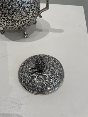 Lot 206 - A KUTCH SILVER TEASET, OOMERSI MAWJI OF BHUJ, WESTERN INDIA, 1880-1890