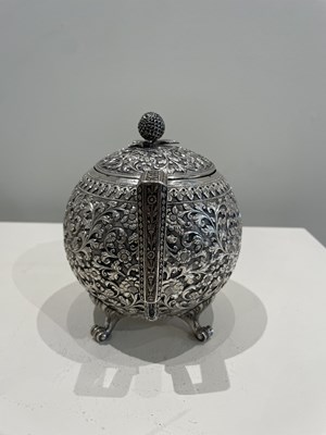Lot 206 - A KUTCH SILVER TEASET, OOMERSI MAWJI OF BHUJ, WESTERN INDIA, 1880-1890