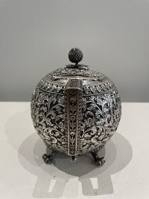 Lot 206 - A KUTCH SILVER TEASET, OOMERSI MAWJI OF BHUJ, WESTERN INDIA, 1880-1890