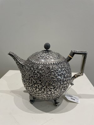 Lot 206 - A KUTCH SILVER TEASET, OOMERSI MAWJI OF BHUJ, WESTERN INDIA, 1880-1890