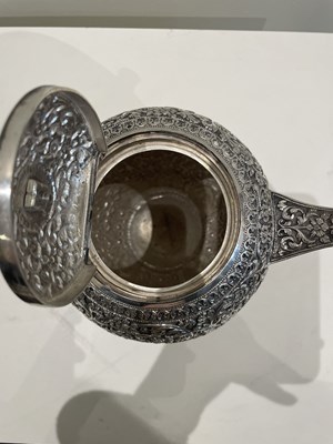 Lot 206 - A KUTCH SILVER TEASET, OOMERSI MAWJI OF BHUJ, WESTERN INDIA, 1880-1890