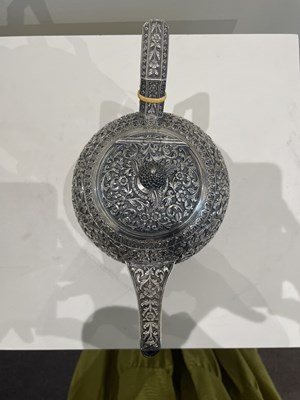 Lot 206 - A KUTCH SILVER TEASET, OOMERSI MAWJI OF BHUJ, WESTERN INDIA, 1880-1890