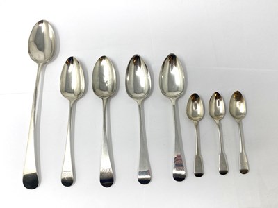 Lot 558 - A GEORGE III SILVER GRAVY SPOON AND FOUR TABLESPOONS, VARIOUS MAKERS, LONDON, 1791-1803
