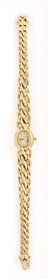 Lot 534 - CORUM: LADY'S GOLD BRACELET WATCH, SWISS, CIRCA 1988