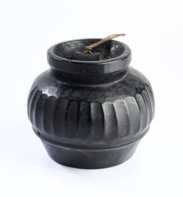 Lot 216 - A SOUTH-EAST ASIAN CARVED WOOD BOWL, PROBABLY INDONESIA, CIRCA 19TH CENTURY