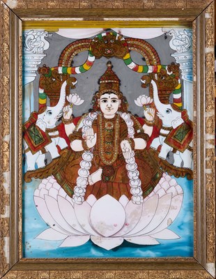 Lot 83 - A REVERSE GLASS PAINTING OF GAJALAKSHMI, TANJORE (THANJAVUR), SOUTH INDIA, CIRCA 1900
