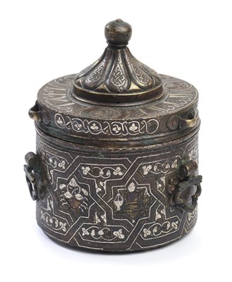 Lot 89 - A KHORASAN SILVER INLAID BRONZE INKWELL, CIRCA 13TH CENTURY