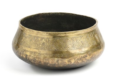 Lot 93 - A MAMLUK ENGRAVED BRASS BASIN, EGYPT OR SYRIA, 14TH CENTURY