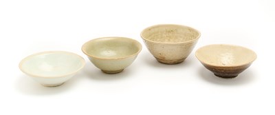 Lot 224 - FOUR CELADON GLAZED BOWLS, SOUTH-EAST ASIA, 12TH-14TH CENTURIES
