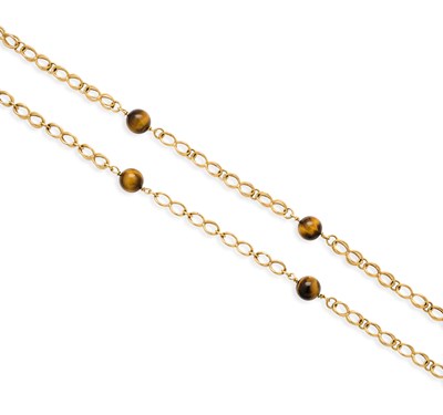 Lot 754 - GOLD AND TIGER'S EYE CHAIN, 1972