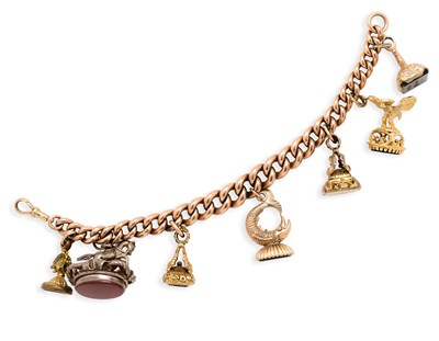 Lot 571 - GOLD CHARM BRACELET, 1890s AND LATER