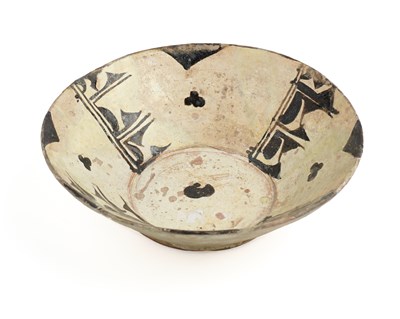 Lot 353 - A SAMANID SLIP PAINTED POTTERY BOWL, CENTRAL ASIA OR NORTH EASTERN PERSIA, 10TH CENTURY