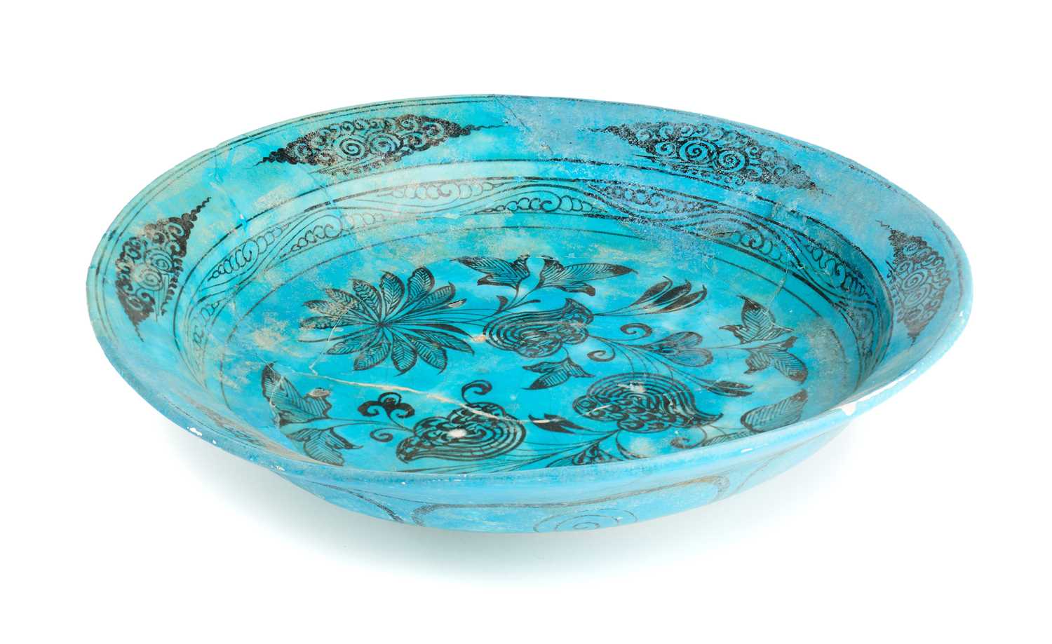 Lot 360 - A TIMURID BLACK PAINTED TURQUOISE GLAZED DISH, PERSIA, CIRCA 15TH CENTURY