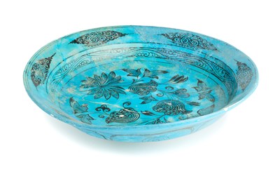 Lot 360 - A TIMURID BLACK PAINTED TURQUOISE GLAZED DISH, PERSIA, CIRCA 15TH CENTURY